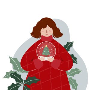Tristeza en Navidad: Por qué está bien no sentir ilusión en estas fiestas. 5 mujer sujetando una bola con un árbol de navidad dentro